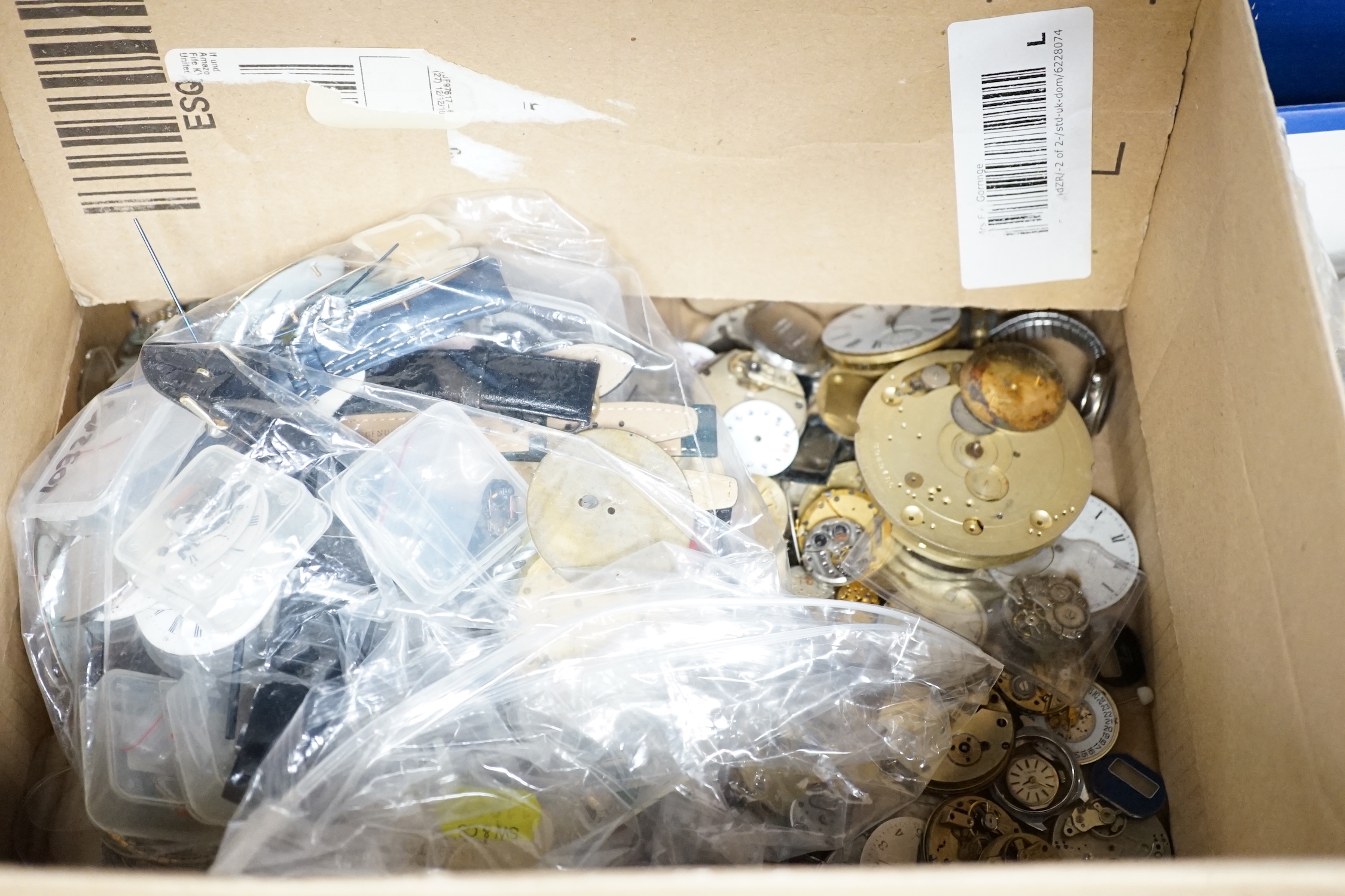 A large quantity of assorted wrist and pocket watch parts and movements, together with assorted fob watches including silver.